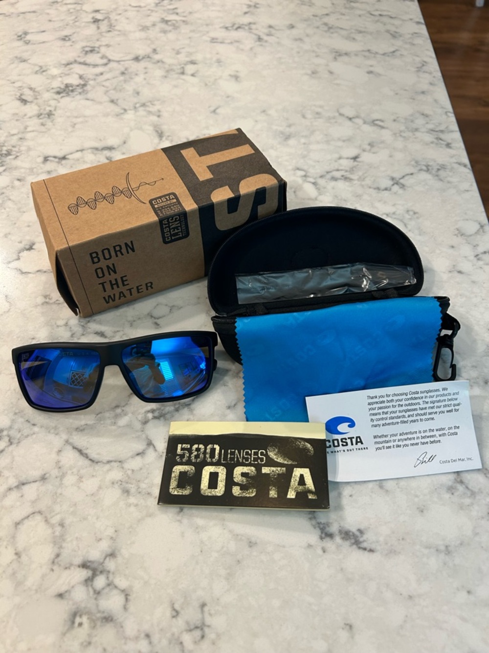 Costa Men’s Black Frame Sunglasses with Blue Mirror Lenses